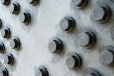 Altıgen cıvata başlıklı gri metal yüzey