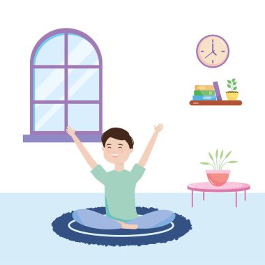 Güvende, mutlu bir genç olarak 19 numaralı karantina sırasında yerde halıyla oturuyor.