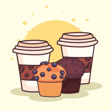 Kahve fincanları ve kekler.