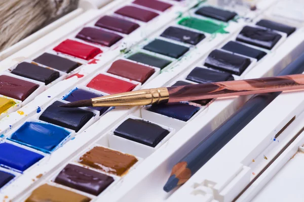 Artists watercolour paints and paint brush — Stock Photo, Image