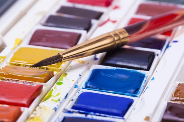 Artists watercolour paints and paint brush — Stock Photo, Image