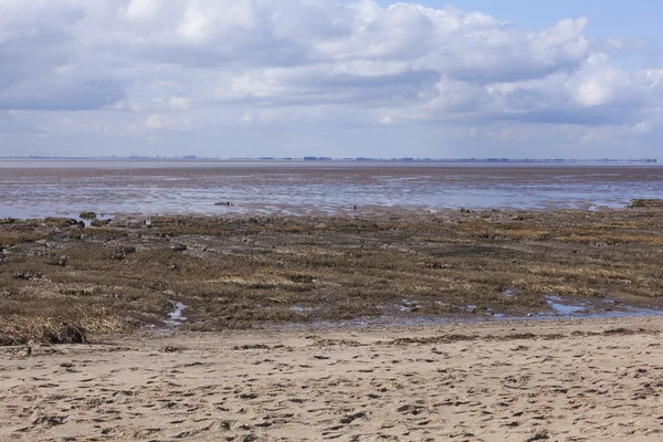 Apartamentos de lama na maré baixa, Spurn Point Nature Reserve — Fotografia de Stock