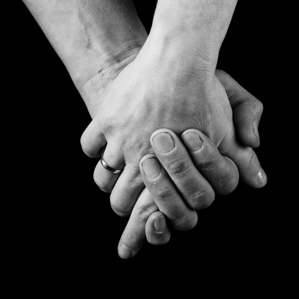 Samec a samice, drželi se za ruce Stock Snímky