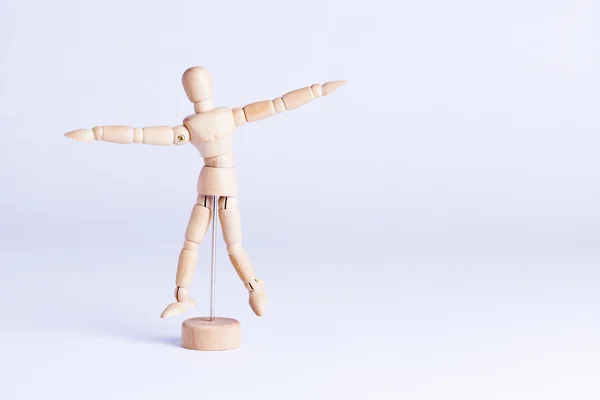 Wooden mannekin on white background — Stock Photo, Image