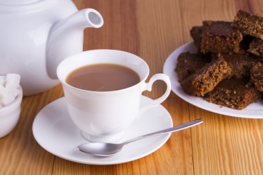Cup of English Tea with Cake for Tea Break in Afternoon clipart