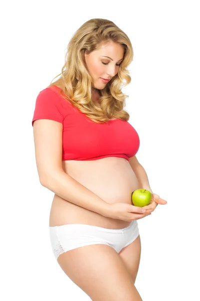 Donna incinta con mela — Foto Stock