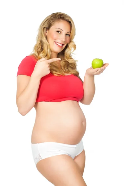 Femme enceinte avec pomme — Photo