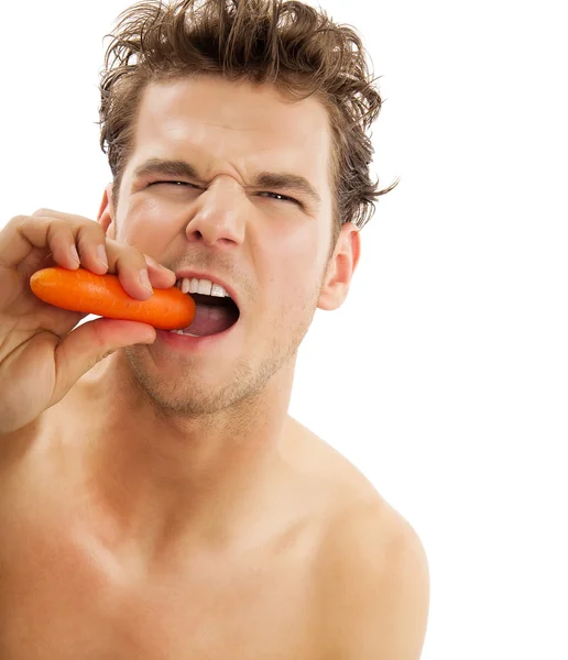 Man With Carrot Stock Image