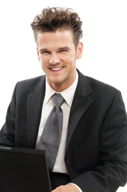 dizüstü bilgisayar ile genç işadamı