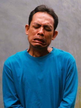 Güneydoğu Asyalı bir adamın komik, aptal ya da 