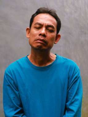 Güneydoğu Asyalı bir adamın komik, aptal ya da 