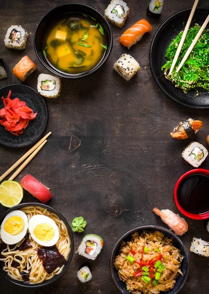 Sushi and japanese food on dark background — Stock Image Sushi and japanese food on dark background Stock Picture