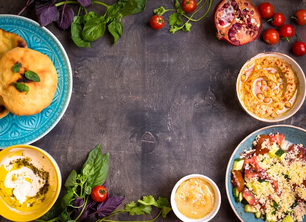 Table served with middle eastern vegetarian dishes. Hummus, tahi — Stock Photo, Image