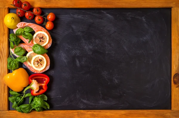 Raw salmon steaks and fresh ingredients for cooking — Stock Fotó