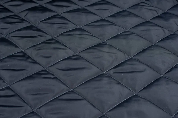 Die Textur Des Schwarzen Stoffes Ist Quadratisch Genäht — Stockfoto