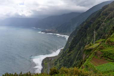 View of green mountains and Atlantic coast of Madeira in Miradouro da Eira da Achada