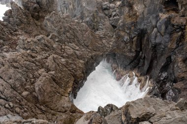 Natural Lava Rock Blowhole with Crashing Waves in Porto Moniz, Madeira, Portugal