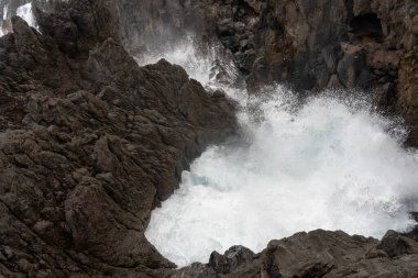 Natural Lava Rock Blowhole with Crashing Waves in Porto Moniz, Madeira, Portugal