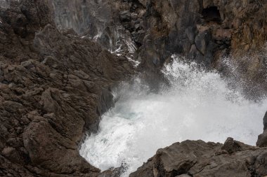 Natural Lava Rock Blowhole with Crashing Waves in Porto Moniz, Madeira, Portugal