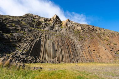Volcanic basalt hexagonal columns  in Pico de Ana Ferreira on Porto Santo Island, Madeira, Portugal