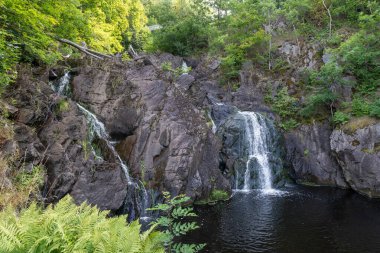 Husqvarnafallen Husqvarna şelalesinin yanında Husqvarna Müzesi, İsveç