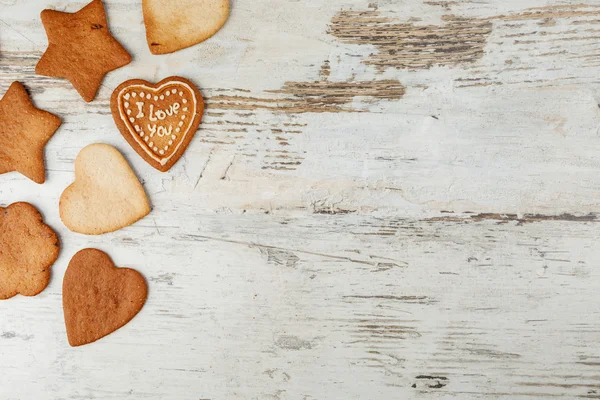 Cookies na dřevěném pozadí — Stock fotografie