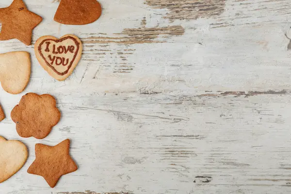 Cookies na dřevěném pozadí — Stock fotografie