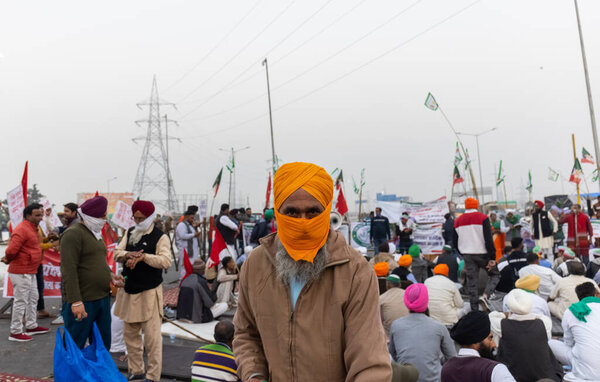 NEW DELHI, INDIA - DECEMBER 2020 : Thousands of farmers from various states march towards the India capital to protest against new agricultural laws they say will severely hurt their incomes, loss of land according to farmers union.