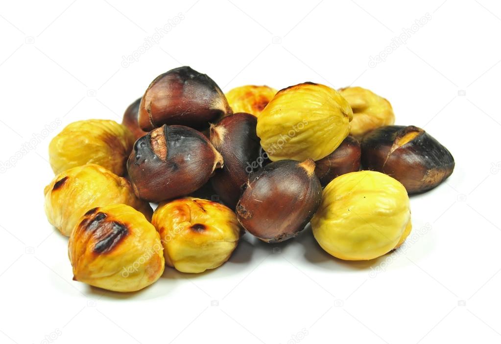 Roasted chestnuts on white background