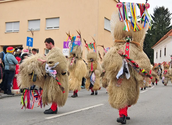 Traditional carnival with traditional figures, known as kurent, — Stock Photo, Image