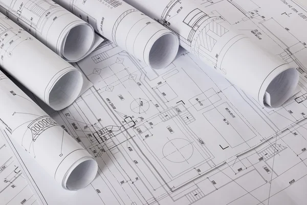 Architectural blueprints and blueprint rolls Stock Image
