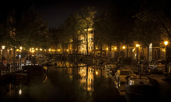 Amsterdam night: lights and canal — Stock Photo, Image