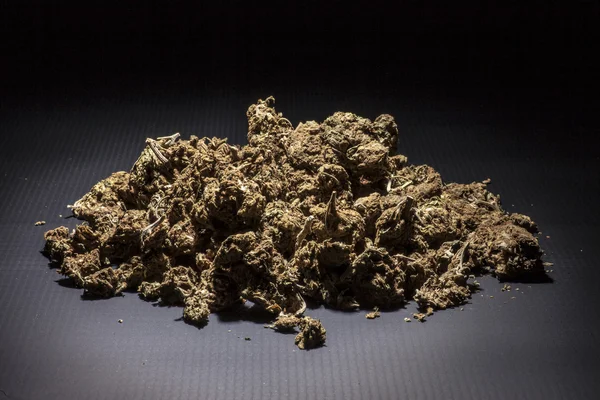 Marijuana isolated on a black background — Stock Photo, Image