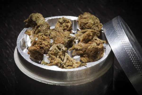 Metal grinder with marijuana — Stock Photo, Image