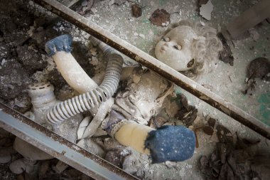 Chernobyl - Doll placed under metal beams clipart