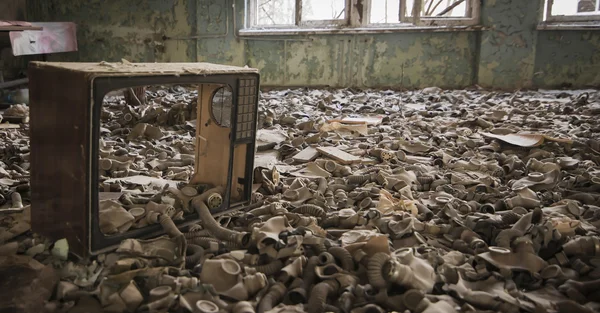 Chernobyl - gas masks on the floor — Stock Photo, Image