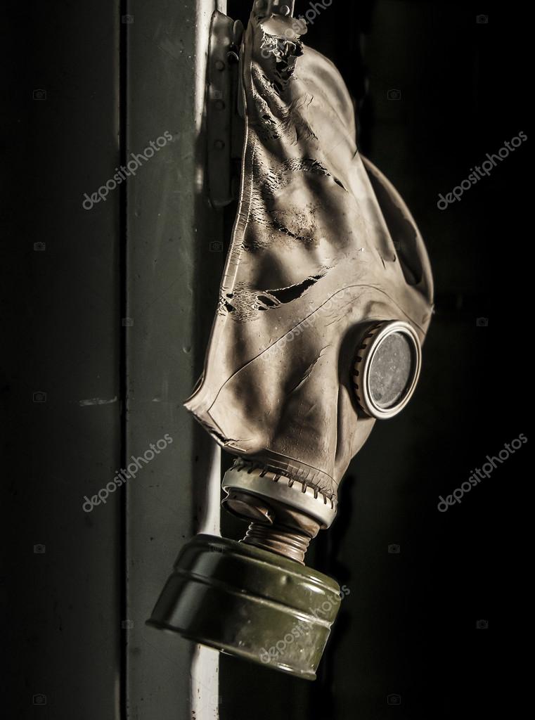 Chernobyl - gas mask hanging on locker Stock Photo by ©enolabrain