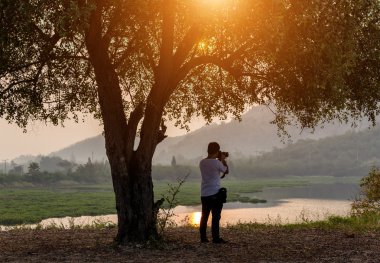 Fotoğrafçı Günbatımı Fotoğraf çekimi