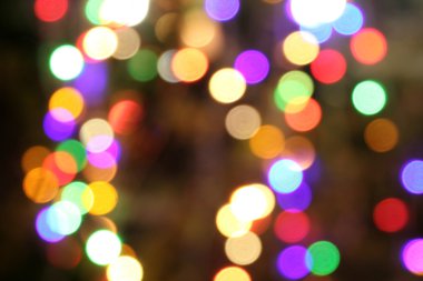 Çoklu renkli odaklanmış bokeh ışıkları arkaplanı