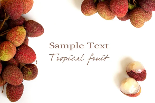 Fresh lychee as frame with space for text at the middle — Stock Photo, Image