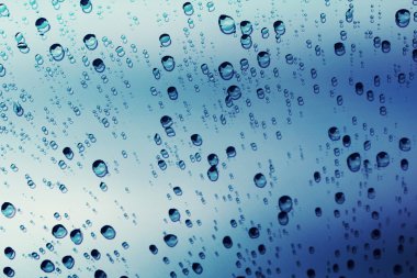 cam, arka plan üzerinde yağmur damlaları