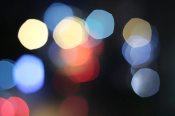 Latar belakang lampu bokeh warna-warni yang tidak fokus — Stok Foto