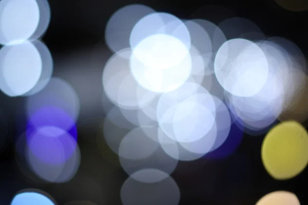 City lights blurred bokeh background — Stock Photo, Image