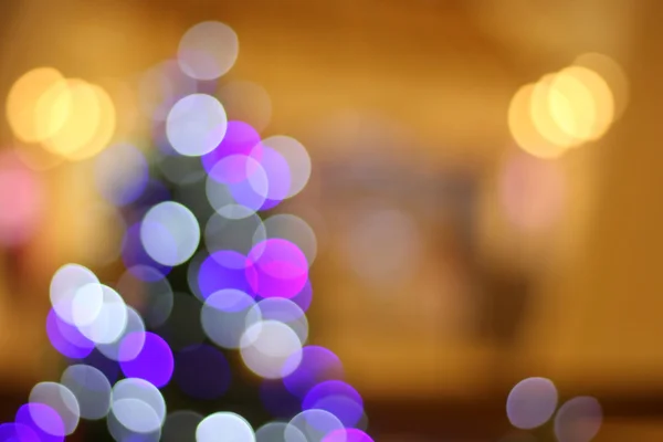 Desfocado abstrato árvore de natal luz bokeh fundo — Fotografia de Stock