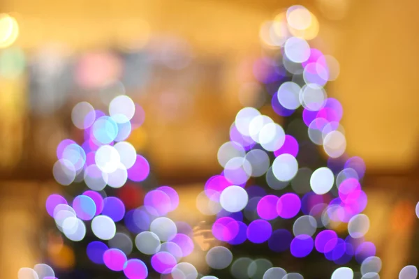 Desfocado abstrato árvore de natal luz bokeh fundo — Fotografia de Stock