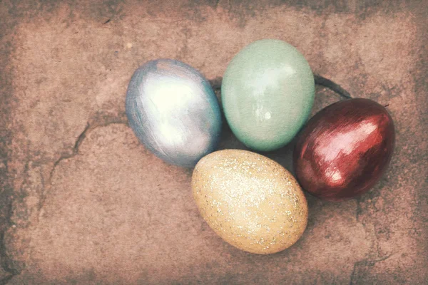 Vintage paper texture, Colorful easter eggs on stone floor. — Stock Photo, Image