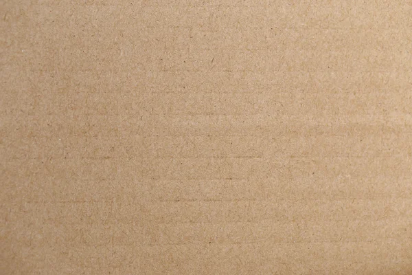 Papel marrom, textura de papelão para fundo . — Fotografia de Stock