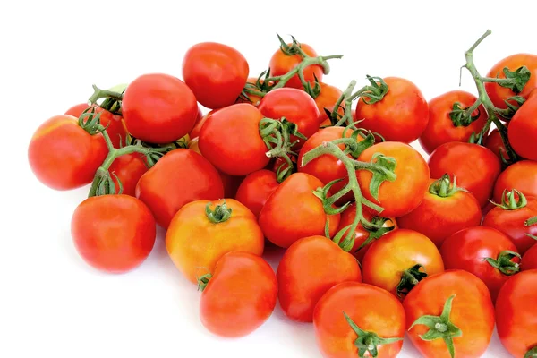 Grupo de tomates rojos sobre fondo blanco . — Foto de Stock