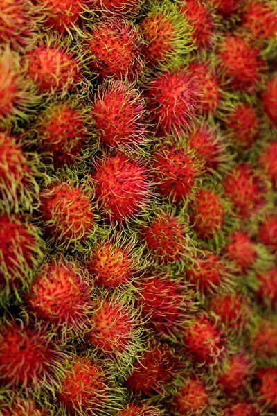 Tropikal meyve Rambutan için arka plan için seçici yakın çekim — Stok fotoğraf