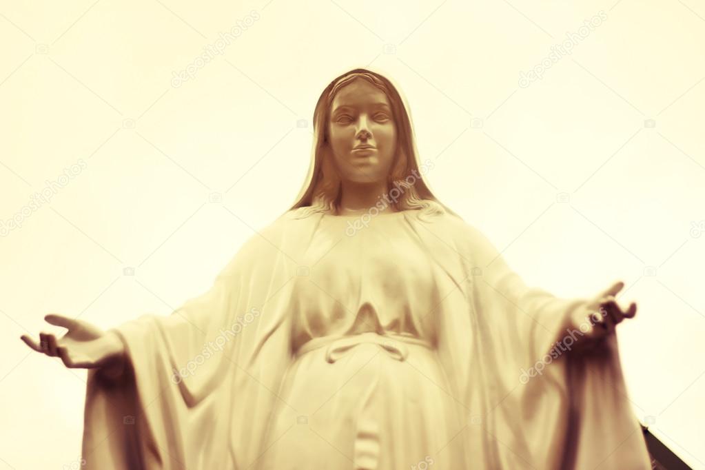 Vintage sepia image of of the Virgin Mary statue.
